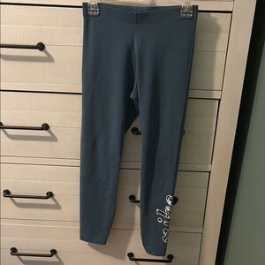Nike blue leggings with flower logo